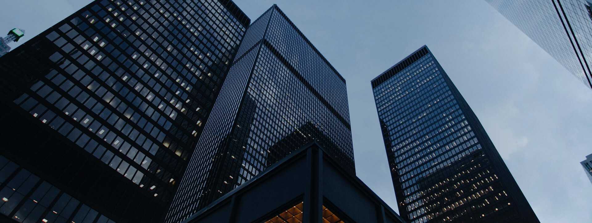 Skyscraper office blocks viewed from below.