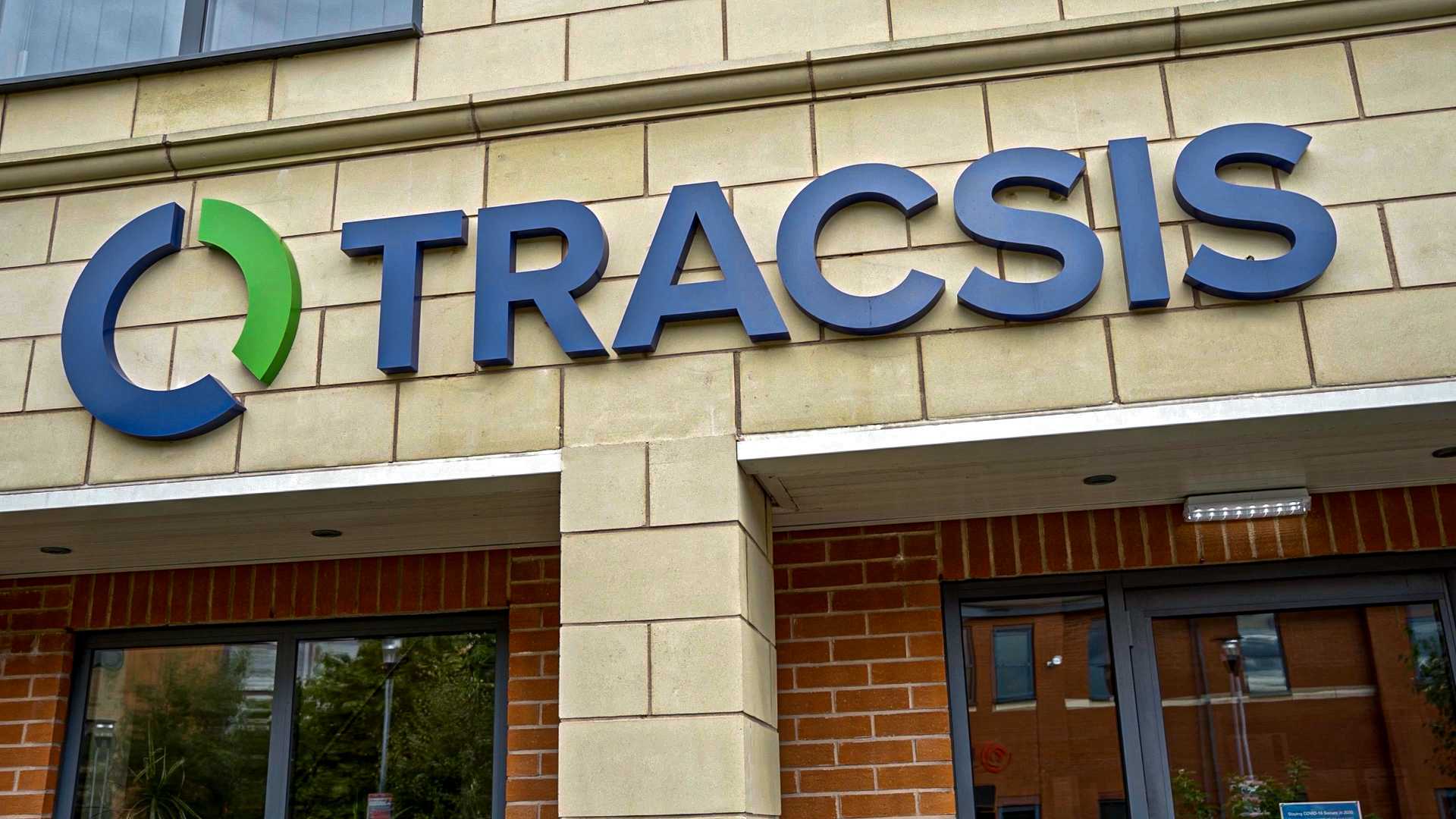 The 'Tracsis' logo on the side of a building.
